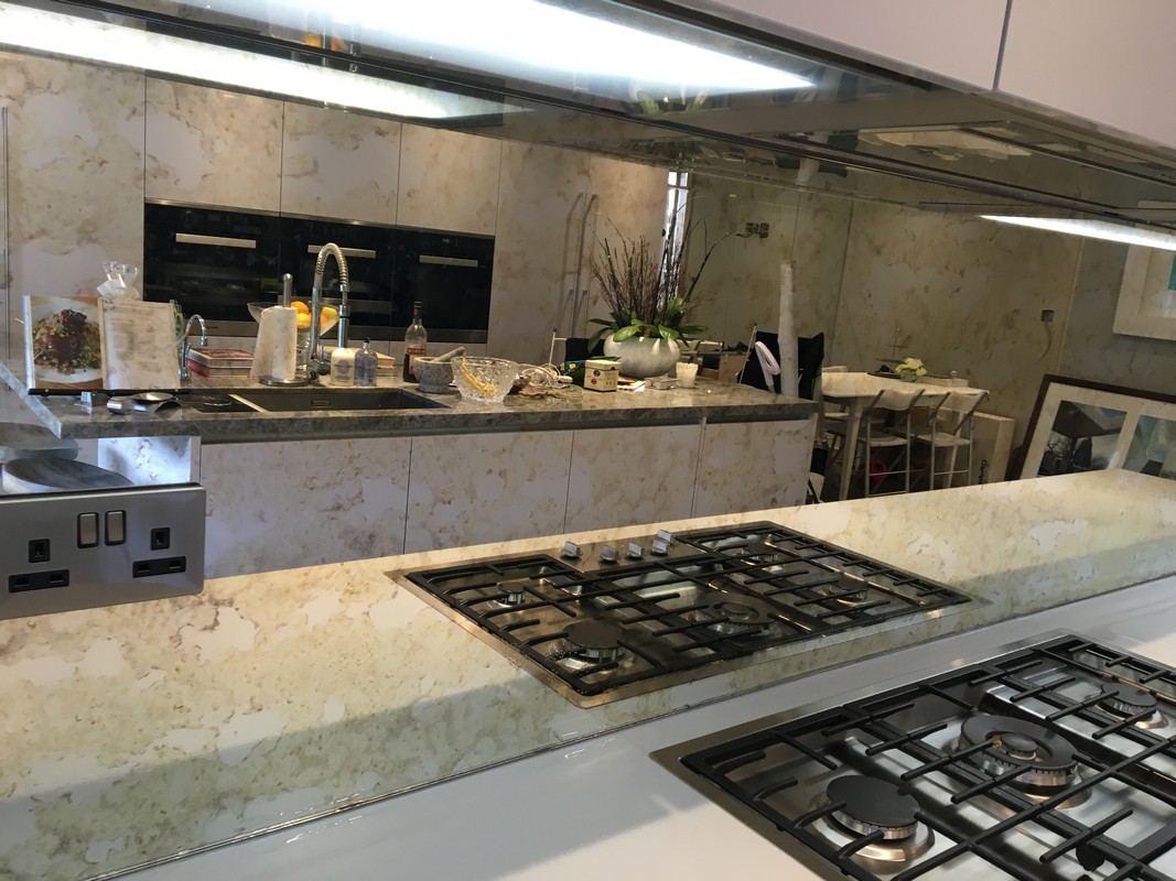 Mirror glass splashback in Harpenden luxury kitchen